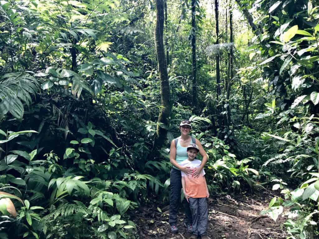 My son and I surrounded by trees.