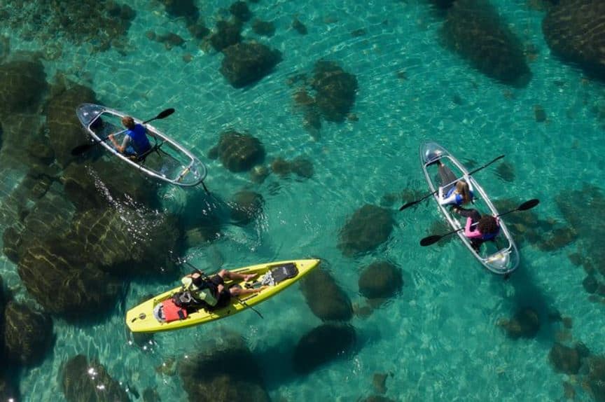 things to do in tahoe in summer - view of kayakers in blue water from above